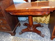 A 19th C. MAHOGANY GAMES TABLE, THE ROUNDED RECTANGULAR TOP SWIVELLING OPEN ON A GUN BARREL