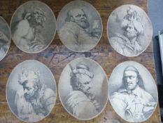 A GROUP OF SEVEN ANTIQUE OVAL OLD MASTER PORTRAIT PRINTS OF MEN IN VARIOUS GUISES. 35 x 29cms (7)