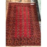 TWO AFGHAN BOKHARA RUGS. 180 x 123 AND 217 x 117cms (2)