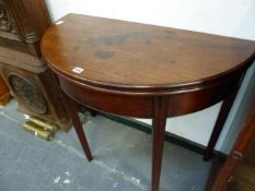 A GEORGE III MAHOGANY DEMILUNE TEA TABLE OPENING ON A DOUBLE GATE, THE SQUARE LEGS CHANNELLED. W