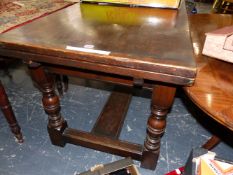 A 20th C. BESPOKE CARVED OAK DRAW LEAF TABLE ON TURNED LEGS JOINED BY AN H-SHAPED STRETCHER AT THE