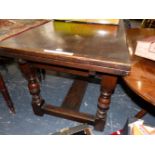 A 20th C. BESPOKE CARVED OAK DRAW LEAF TABLE ON TURNED LEGS JOINED BY AN H-SHAPED STRETCHER AT THE