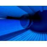 A LUXURA DELTA GOOD COMMERCIAL QUALITY UPRIGHT SUNBED TANNING BOOTH COMPLETE WITH TUBES, AND