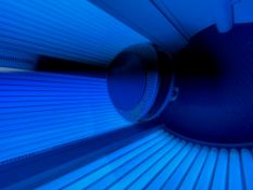 A LUXURA DELTA GOOD COMMERCIAL QUALITY UPRIGHT SUNBED TANNING BOOTH COMPLETE WITH TUBES, AND