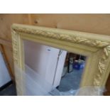A MODERN RECTANGULAR MIRROR IN A FOLIATE GILT FRAME. TOGETHER WITH A PIANO STOOL