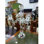 A CUT GLASS CANDELABRA.