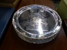 TEN SILVER PLATED ARMORIAL DECORATED PLATTERS.