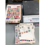 A LARGE COLLECTION OF STAMPS.