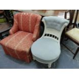 A VICTORIAN TERRACOTTA UPHOLSTERED NURSING CHAIR TOGETHER WITH A WHITE PAINTED NURSING CHAIR WITH T