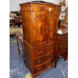 A MODERN MAHOGANY BOW FRONT CABINET WITH A CUPBOARD OVER THREE DRAWERS AND BRACKET FEET. W 55 x D 41