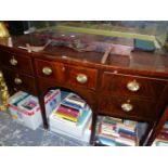 A LATE GEORDIAN MAHOGANY SIDEBOARD, THE BOW FRONT WITH FIVE DRAWERS, THE SQUARE SECTIONED LEGS TAPER