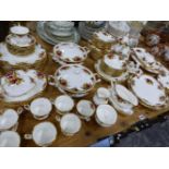 AN EXTENSIVE ROYAL ALBERT, OLD COUNTY ROSES PATTERN DINNER AND TEA SERVICE.