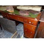 A VICTORIAN MAHOGANY PEDESTAL DESK, THE GREEN LEATHER INSET TOP ABOVE A KNEEHOLE DRAWER FLANKED BY