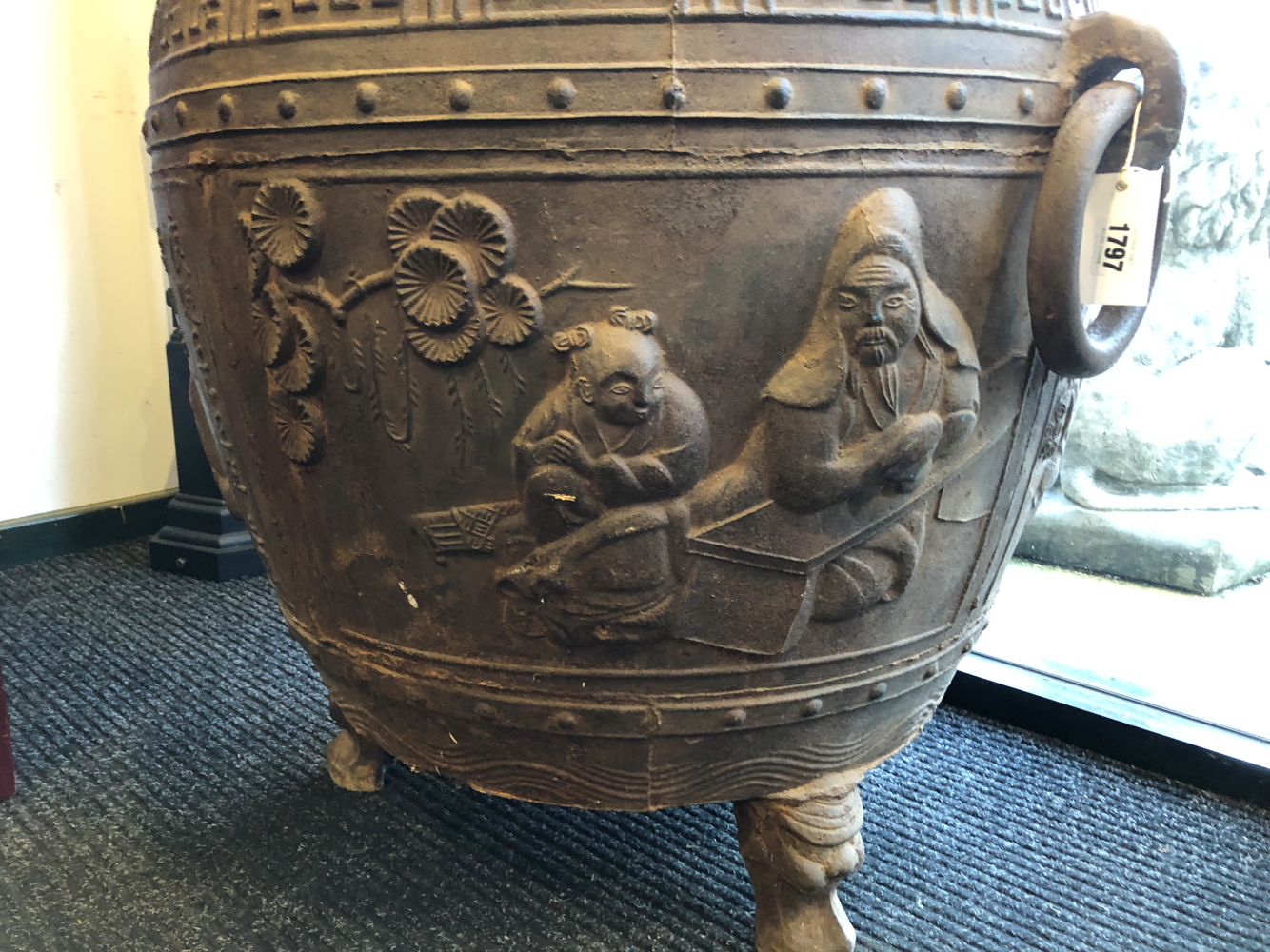 A CHINESE CAST IRON RING HANDLED CAULDRON, THE ROUNDED SIDES CAST WITH FIGURES AND INSCRIPTIONS - Image 8 of 9