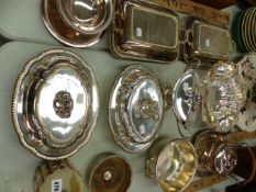 TWO PAIRS OF SILVER PLATED TUREENS, A SWING HANDLED BASKET, TEA CADDY, COASTER, ETC.