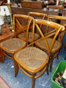 A SET OF FOUR STAINED WOOD CHAIRS WITH X-SHAPED LATH BACKS, CANED SEATS AND CURVED FRONT LEGS