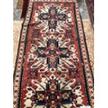 AN ANTIQUE CAUCASIAN KAZAK RUG. 235 x 126cms