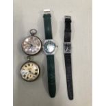AN ANTIQUE SILVER POCKET WATCH, A SERVICES POCKET WATCH , A HUBER WRISTWATCH AND A LATER SWATCH
