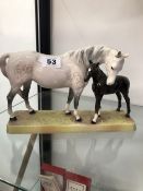 A BESWICK HORSE AND FOAL FIGURE GROUP.