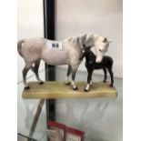 A BESWICK HORSE AND FOAL FIGURE GROUP.