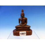 A 19th C. BRONZE BUDDHA SEATED WITH HIS HANDS ON HIS LAP AND A HAND SHAPED USNISA ON TOP OF HIS
