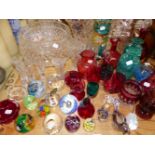 A COLLECTION OF CRANBERRY GLASSWARES, CUT GLASS BOWLS AND VASES, VARIOUS PAPERWEIGHTS AND DECANTERS.