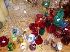 A COLLECTION OF CRANBERRY GLASSWARES, CUT GLASS BOWLS AND VASES, VARIOUS PAPERWEIGHTS AND DECANTERS.