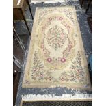 TWO ORIENTAL RUGS OF BOKHARA DESIGN, TOGETHER WITH A SMALL AUBUSSON DESIGN RUG. 268 x 77, 157 x 92