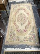 TWO ORIENTAL RUGS OF BOKHARA DESIGN, TOGETHER WITH A SMALL AUBUSSON DESIGN RUG. 268 x 77, 157 x 92