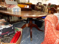A 19th C. CROSS BANDED MAHOGANY BREAKFAST TABLE WITH A ROUNDED RECTANGULAR TOP ON A COLUMN AND