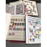 A QUANTITY OF STAMPS IN SEVEN ALBUMS AND STOCK BOOKS.