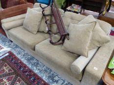 A BEIGE UPHOLSTERED TWO SEAT SETTEE. W 199cms.