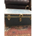 A VINTAGE SMALL TRAVEL TRUNK
