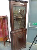 A 20th C. SATIN WOOD BANDED MAHOGANY CORNER CUPBOARD, THE UPPER HALF GLAZED AND THE LOWER WITH