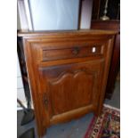 A 19th CENTURY FRENCH CARVED OAK SIDE CABINET.