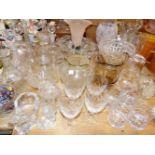 A QUANTITY OF VARIOUS VINTAGE GLASS WARES, INCLUDING VASES, BOWLS, DRINKING WARES AND DECANTERS.