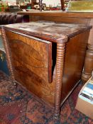 A 19th C. MAHOGANY CUPBOARD, THE TWO DOORS WITH EBONY LINE INLAID OVALS AND OPENING BETWEEN RING