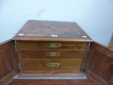 AN ANTIQUE WALNUT THREE DRAWER CUTLERY CABINET.