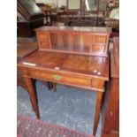 A MODERN MAHOGANY WRITING TABLE, THREE PIGEON HOLES FLANKED BY PAIRS OF DRAWERS RECESSED BEHIND