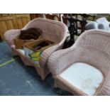 A PINK BASKET WEAVE TWO SEAT SETTEE TOGETHER WITH AN ARMCHAIR EN SUITE