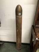 A MILITARY DUMMY 120MM "WOMBAT" ANTI TANK FIELD GUN SHELL.