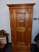 A MODERN PINE WARDROBE. W 93 x D 62.5 x H 196cms.