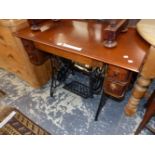 AN IRON SINGER SEWING MACHINE TABLE NOW WITH A MAHOGANY TOP. W 98 x d 52 x H 74cms.