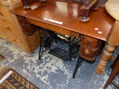 AN IRON SINGER SEWING MACHINE TABLE NOW WITH A MAHOGANY TOP. W 98 x d 52 x H 74cms.