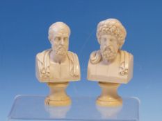 A PAIR OF GRAND TOUR IVORY BUSTS ON SOCLE
