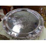 A LARGE COLLECTION OF SILVER PLATED PLATTERS WITH ARMORIAL PATTERN (10).