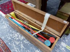 A VINTAGE CROQUET SET.