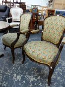 A PAIR OF STAINED WOOD FAUTEUILS, THE BACKS, ELBOW RESTS AND SERPENTINE FRONTED SEATS IN YELLOW