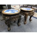 A PAIR OF 19th C. CHINESE HARDWOOD INSET WITH BLUE AND WHITE PORCELAIN STANDS, THE LATTER PAINTED