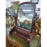 A VICTORIAN MAHOGANY DRESSING TABLE MIRROR, THE SCROLLING ARM SUPPORTS ON A BOX WITH SLIDE OPEN
